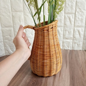 Wicker vase for flowers. Basket for artificial flowers or dried flowers. Decorative jug for home decoration. Photo props for home. image 5