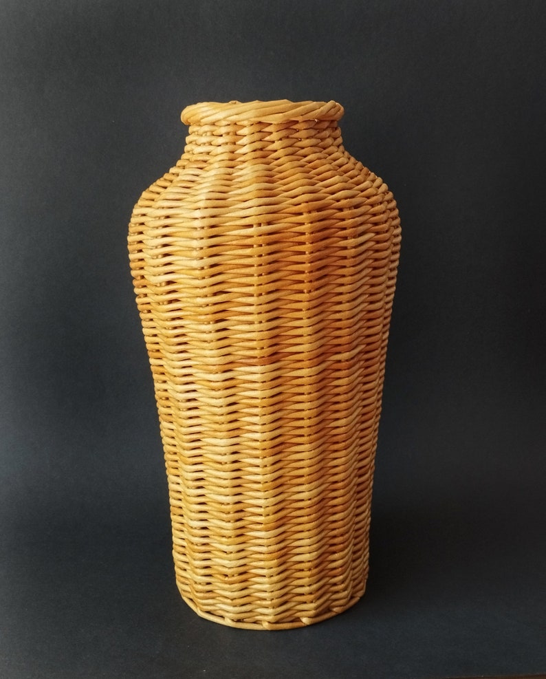 Wicker vase for flowers. Basket for artificial or dried flowers. Decorative jug for home decoration. 1