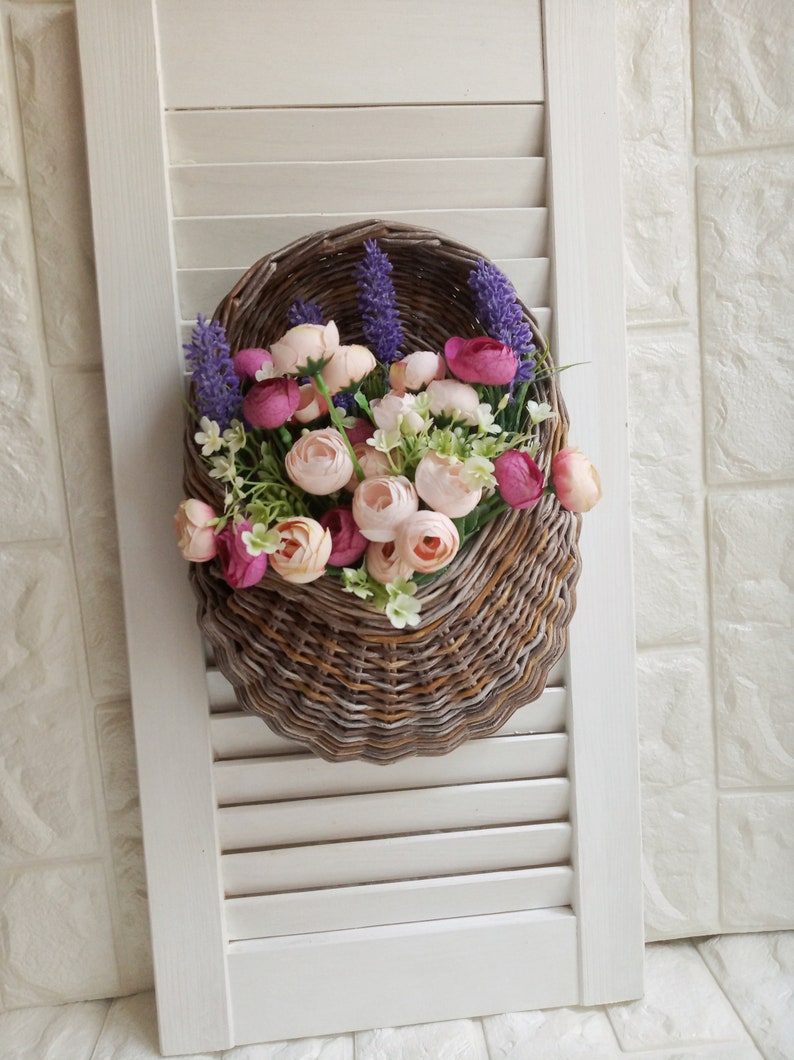 Basket on the door. Oval flower basket.Front door decoration. Straw-colored wicker basket, front door decoration.Hanging basket on the door. image 3