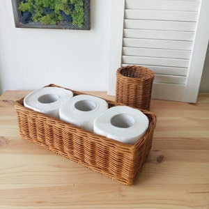 Set of two bathroom baskets. A wicker rectangular basket for toilet paper and a small round one for small items. Toilet paper holder. image 2