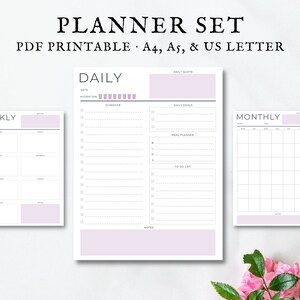 May include: A printable planner set with daily, weekly, and monthly pages. The pages are white with black text and a light purple accent color. The planner set is available in A4, A5, and US Letter sizes.