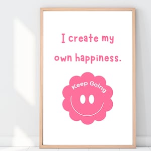 May include: A pink framed motivational poster with the text "I create my own happiness." and a pink smiley face with the text "Keep Going" in white.