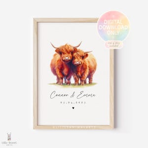 May include: A framed print featuring two Highland cows with long, shaggy, reddish-brown fur. The print includes the names "Connor & Emma" and the date "05.04.2025" below the cows. A digital download sticker is in the upper right corner.