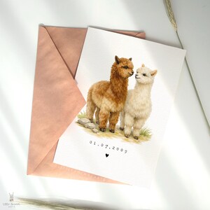 Personalised alpaca couple anniversary card with custom date, romantic animal greeting card for husband, wife or partner, wedding date keepsake card featuring two alpacas in love, luxury fine art printed card on textured cardstock with kraft envelope, cute animal couple illustration for anniversary gift, relationship card, wedding memory card, unique personalised love card for her or him.