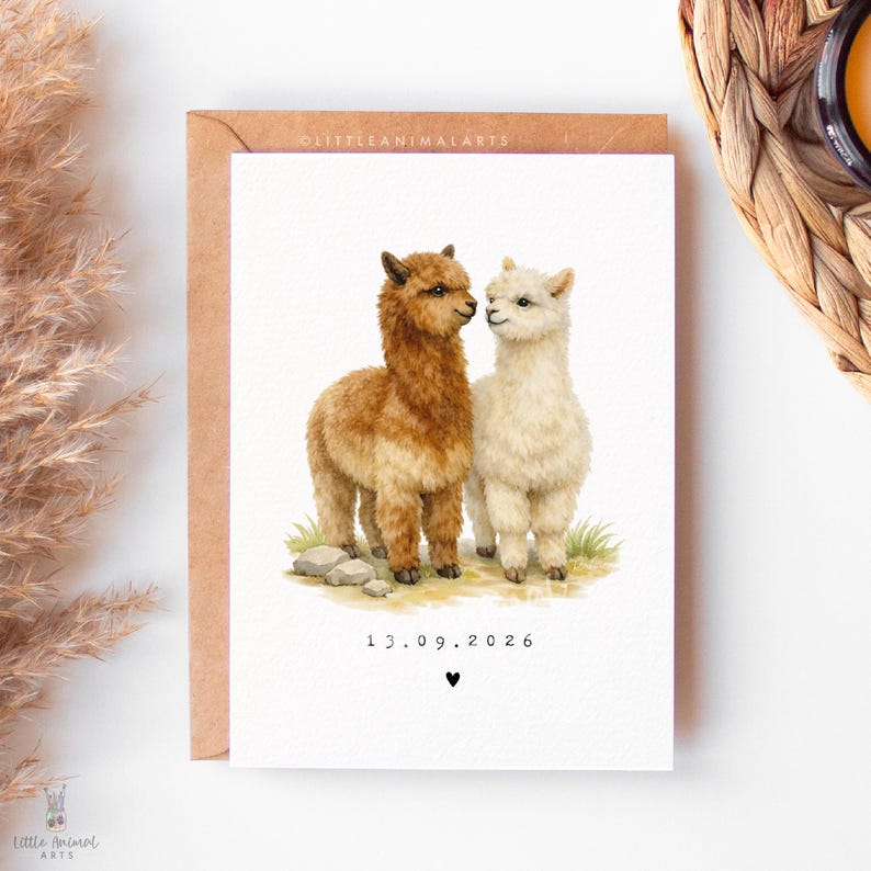 Personalised alpaca couple anniversary card with custom date, romantic animal greeting card for husband, wife or partner, wedding date keepsake card featuring two alpacas in love, luxury fine art printed card on textured cardstock with kraft envelope, cute animal couple illustration for anniversary gift, relationship card, wedding memory card, unique personalised love card for her or him.