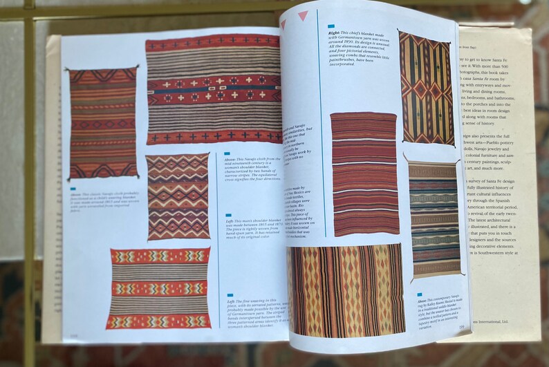 May include: A collection of Native American woven blankets with intricate geometric patterns in shades of red, brown, white, and black. The blankets are displayed on a white background with text describing their history and significance.