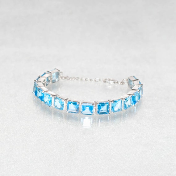 Sparkling Blue Topaz Tennis Bracelet in 18K Solid White Gold with Diamonds  For Sale at 1stDibs