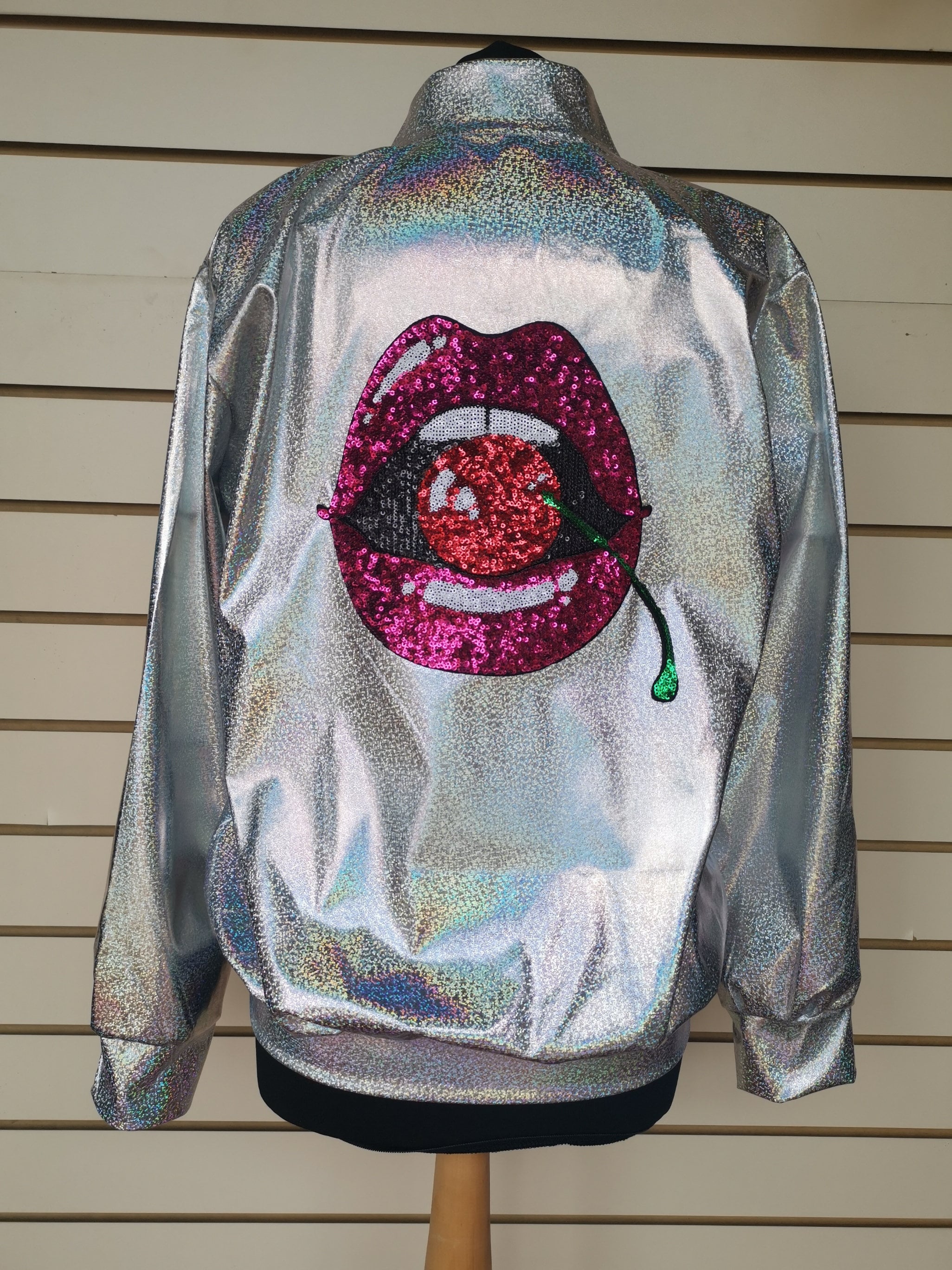 Silver Holographic Jacket With Sequin Covered Cherry in Mouth