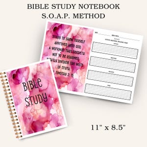 May include: A Bible study notebook with a pink and white watercolor design. The cover reads "Bible Study" and the interior pages are lined for notes. The notebook is 11" x 8.5" and features the S.O.A.P. method.