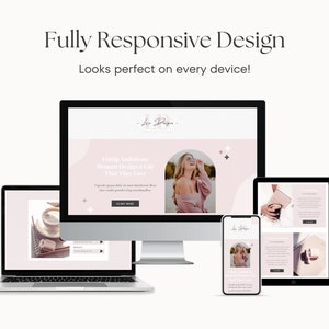 May include: A website design mockup showing a desktop computer, laptop, tablet, and smartphone. The website features a pink and white color scheme with a photo of a woman wearing a pink sweater and glasses. The text on the website reads "I Help Ambitious Women Design a Life That They Love."