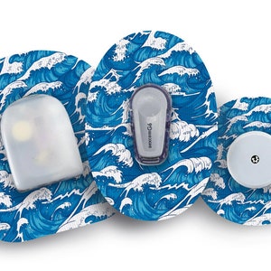 May include: Three blue and white wave patterned medical device patches. The center patch has a small white circle with a black dot in the center. The patch on the left has a clear plastic cover. The patch on the right has a small white rectangle with the text "dexcom G6" printed on it.