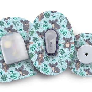 May include: Three round adhesive patches with a blue background and a repeating pattern of gray koalas holding branches and green leaves. The patches are designed to cover medical devices. The text "dexcom G6" is printed on one of the patches.