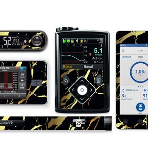 May include: A set of black and gold marble patterned skins for a diabetes monitor, insulin pump, and pen. The skins feature a black background with gold veins.
