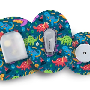 May include: Three colourful dinosaur-themed adhesive patches for a medical device. The patches feature a blue background with green, red, yellow, and purple dinosaurs. One patch has a clear plastic reservoir, another has a small white sensor, and the third has a purple and white medical device with the text "dexcom G6".