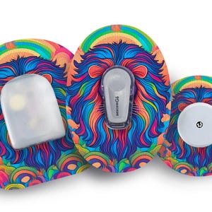 May include: A set of three medical device accessories with a vibrant lion design. The accessories include a sensor, a transmitter, and a receiver, all featuring a colorful rainbow and lion's mane pattern. The devices are designed for medical use.