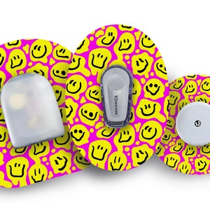 May include: Three round medical patches with a pink background and a yellow smiley face pattern. The patches are designed to be worn on the skin. The text "Dexcom G6" is visible on one of the patches.