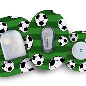 May include: Three round adhesive patches with a green and white soccer ball pattern. The patches are designed to cover medical devices.