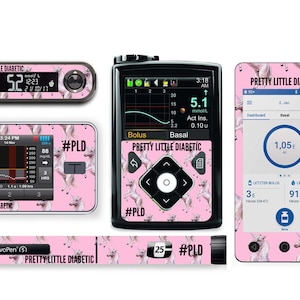 Op de afbeelding: Een set roze en witte unicorn-thema stickers voor een diabetes management apparaat. De stickers hebben een unicorn patroon met de tekst "#PLD" en "Pretty Little Diabetic".