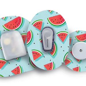 May include: Three round, adhesive patches with a watermelon pattern. The patches are designed to cover medical devices. The centre patch has a clear plastic cover, the left patch has a small, white, medical device, and the right patch has a small, white, round device.
