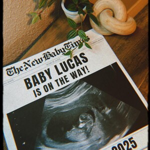 May include: A mock newspaper announcement with the headline "The New Baby Times" and the text "Baby Lucas is on the way!" with a sonogram image and the date "Due March 2025".