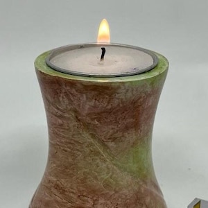 Keepsake Company&#39;s Tealight Cremation Urn in multi color.
