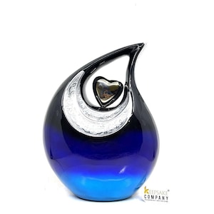 Urna a goccia blu e nera con design a cuore argentato, per ceneri di adulti.