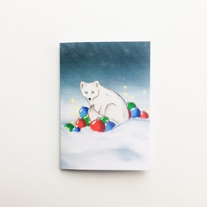 Renard arctique Talvi - Carte de Noël | dessin numérique, illustration à l'aquarelle, scène d'hiver confortable