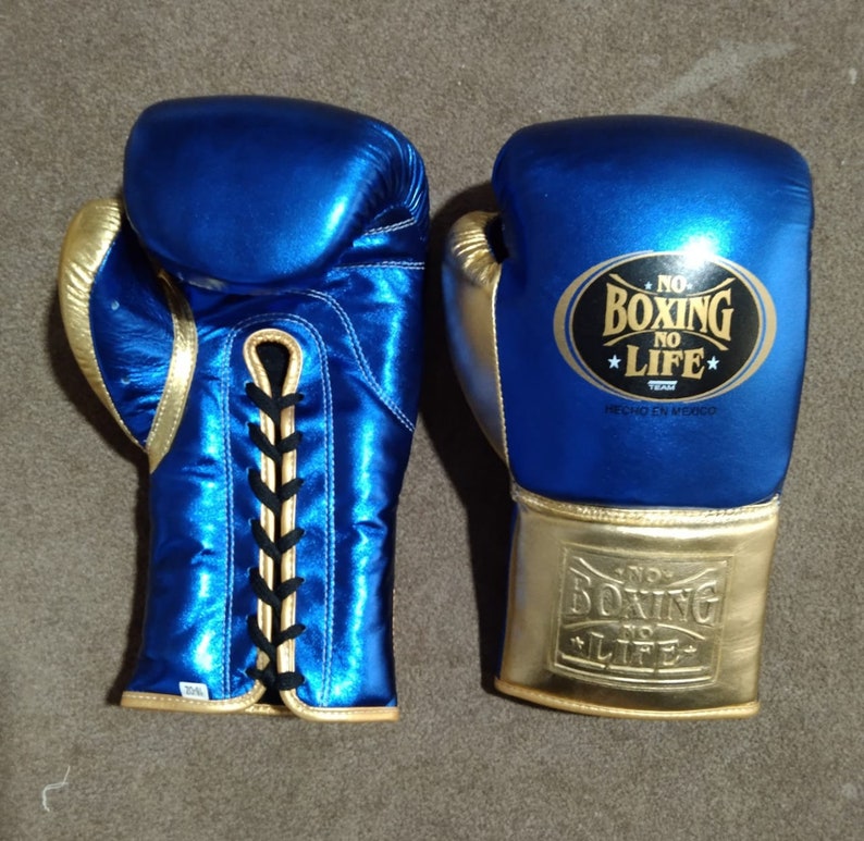 New Boxing Gloves Custom Made with original cowhide leather. New Boxing Gloves Custom Made with original cowhide leather.