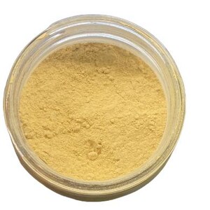 May include: A clear, circular container filled with a fine, pale yellow powder. The container has a transparent rim and a wide opening, revealing the smooth, uniform texture of the powdery substance contained within the jar from a top-down view.