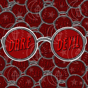 May include: A red and white sticker with the text "Dare Devil" repeated in a pattern. The sticker is in the shape of a pair of round sunglasses.