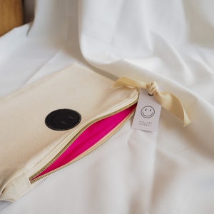 Kosmetiktasche „Happy“