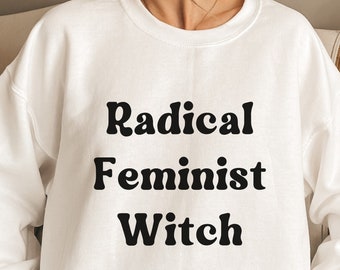 May include: White sweatshirt with black text that reads "Radical Feminist Witch".