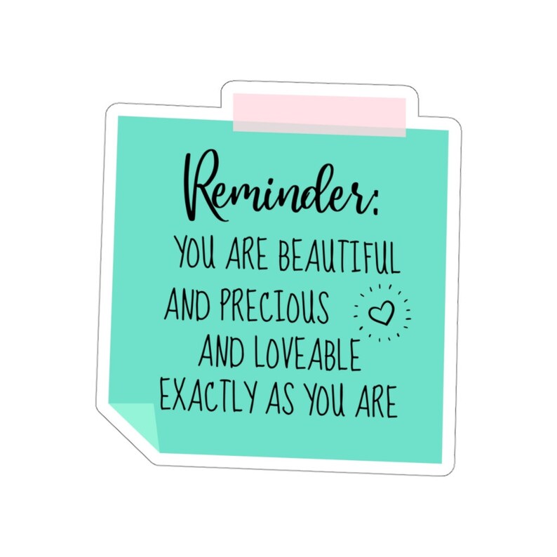 May include: A teal blue sticky note with a pink tab at the top. The note says "Reminder: You are beautiful and precious and loveable exactly as you are." A small heart is drawn next to the word "loveable".