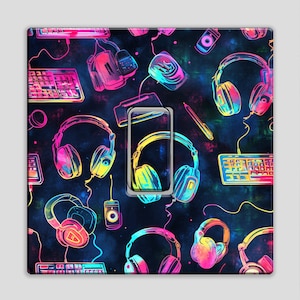 May include: A square design with a repeating pattern of headphones, keyboards, and tech accessories in neon colours. The design is set against a dark blue background with a smartphone in the centre. The colours include pink, yellow, and blue.