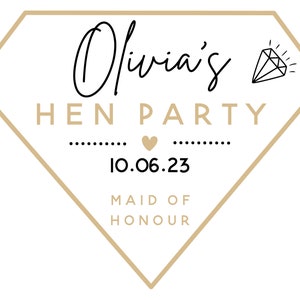 May include: A diamond-shaped graphic with the text "Olivia's HEN PARTY" in black and gold. The date "10.06.23" is centered below the text, with "MAID OF HONOUR" at the bottom. A diamond illustration is in the upper right corner.