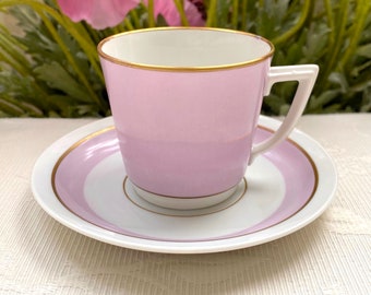 First Class White and Pastel Lavender Pink Royal Copenhagen 1960s Demitasse Cup and Saucer Set. Cup has Hairline. Please See Photos!