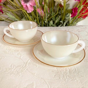 Creamy White Vintage Arcopal France Assorted Opaline Glass Cup and Saucer Set with Gold Trim. Has Color Variations. Price is for 1 Cup Set!