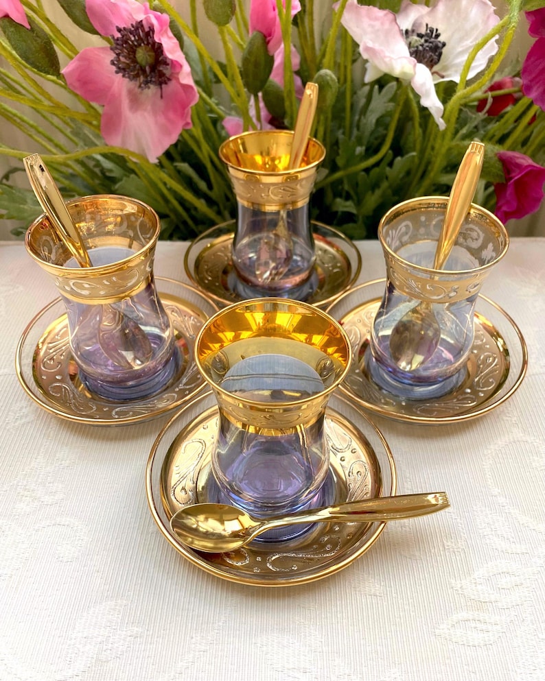 Price is for 1 Cup, 1 Saucer and 1 Spoon. Iridescent Purple Tea Glass
