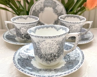 Price is for 1 Cup and 1 Saucer. Royal Doulton Pattern Oriel Fine China Demitasse Cup and Saucer Set. White with Black and Grey Motive