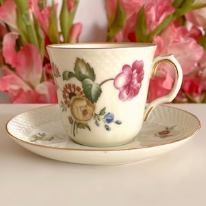 Royal Copenhagen Frijsenborg with Wild Peony Motive, Gold Trim and Off White Color. No. 1546 First Class Demitasse Cup and Saucer Set