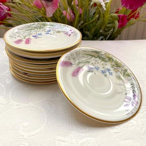 Price is for 1 Saucer. 13 cm Diameter Saucer with Gold Trim and Beautiful Meadow Flower Motive on Off White Porcelain. Krautheim Bavaria