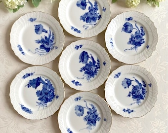 Price is for 1 Plate. Curved Blue Flower Assorted Motive. Royal Copenhagen 15 cm Diameter Cake/Side Plate with Gold Trim. First Class