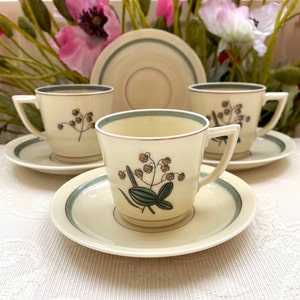 Price is for 1 Cup and 1 Saucer. 1930-1940s Demitasse Cup and Saucer Set with Gold Accent. Green and Off White. Hjertegræs Royal Copenhagen