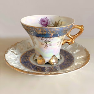 Romantic Pink Rose on Pearl Lustre and Dark Blue Porcelain. Footed Cup and Lace Trim Saucer Set. Beautiful Gold Accent and Details