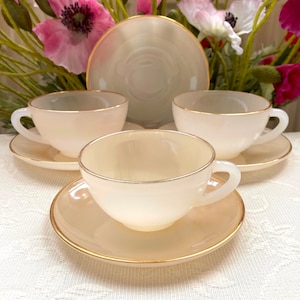 Assorted Arcopal France Vintage Pastel Orange Opaline Glass Cup and Saucer Set with Gold Trim. Has Color Variations. Price is for 1 Cup Set!
