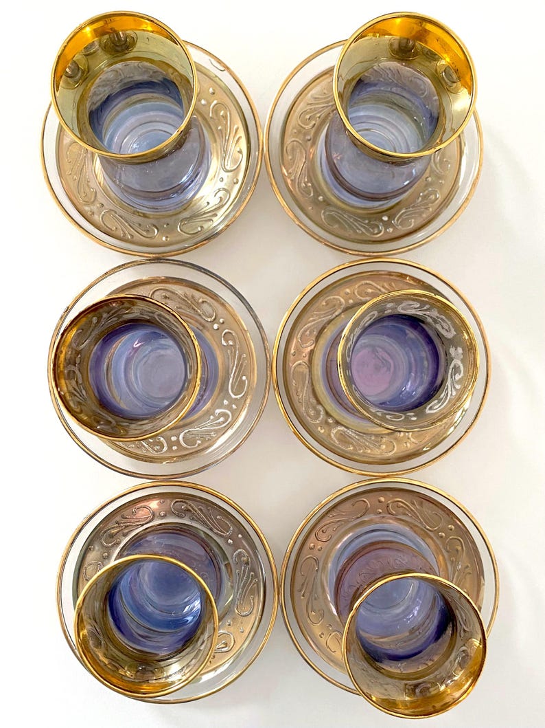 Price is for 1 Cup, 1 Saucer and 1 Spoon. Iridescent Purple Tea Glass