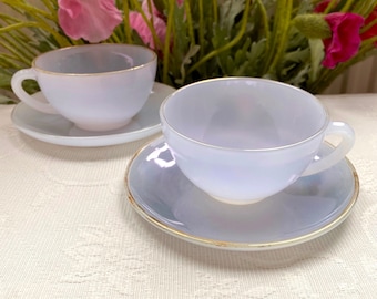 Price is for 1 Cup and 1 Saucer. Arcopal France Assorted Lavender Blue Opaline Glass Cup and Saucer Set with Gold Trim. Color Variations
