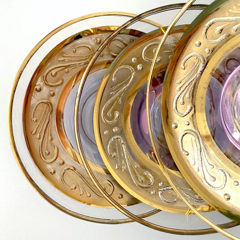 Price is for 1 Cup, 1 Saucer and 1 Spoon. Iridescent Purple Tea Glass