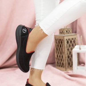 Black Knitted Casual Sneakers with Red Trim, Breathable Mesh Upper, Logo Detail, Thick Ribbed Sole for Everyday Wear