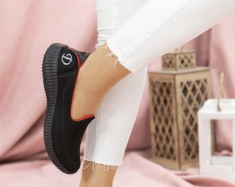 Black Knitted Casual Sneakers with Red Trim, Breathable Mesh Upper, Logo Detail, Thick Ribbed Sole for Everyday Wear